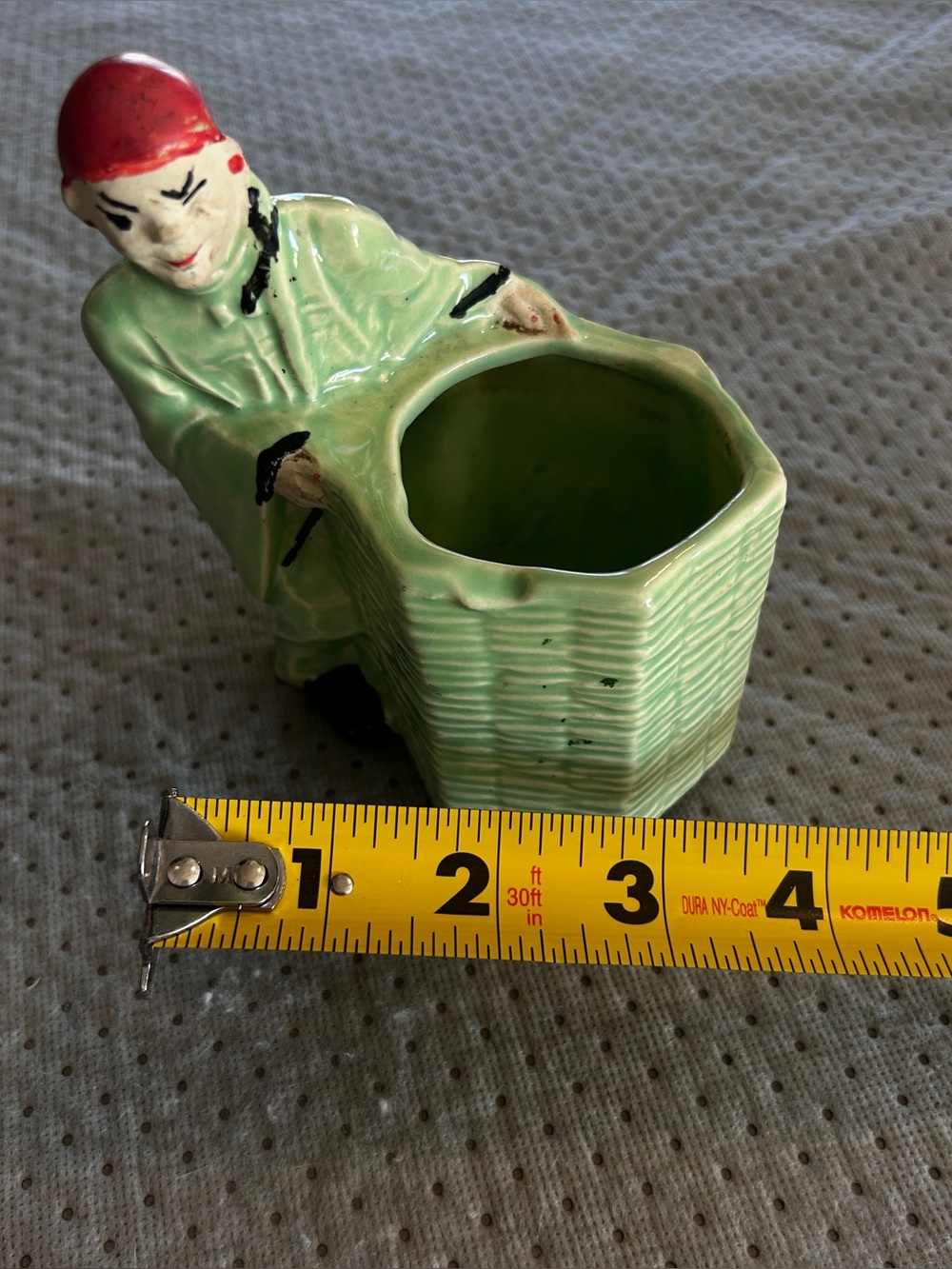 McCoy Planter - Chinese Planter,5 1/2" tall, green with bisque face and hands.